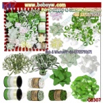 Ex of packaging mix of various size rosettes plus green ribbons. Holiday Bows for Gift Wrapping ribbons gift wrap