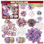 Ex of package mix of rosettes various sizes plus lilac ribbons.etroadhesive rosettes  gift ribbons